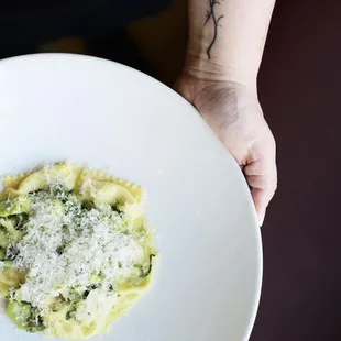 English pea agnolotti as pictured on Instagram (deceiving in portion size for an entree pasta dish)