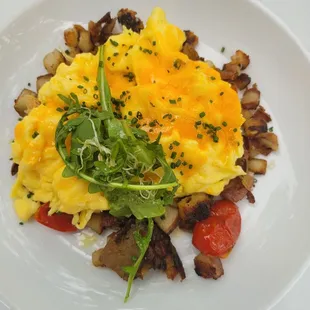 Wild Mushroom Hash with scrambled eggs and cheddar cheese.
