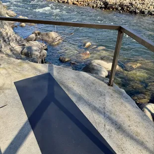 Morning yoga by the river (mat, towels, and mat refresher provided!)