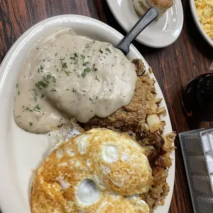 Chicken fried steak and eggs (over medium).