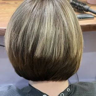 Razor a-line haircut with natural highlights