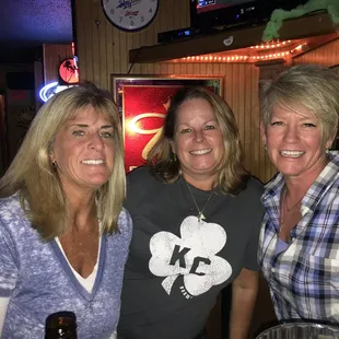 three women posing for a picture