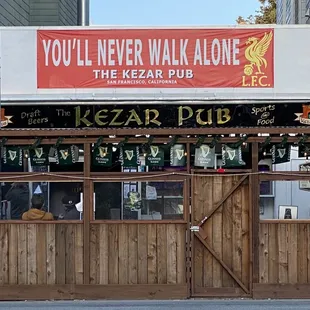 a sign that says you'll never walk alone