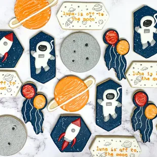 a variety of decorated cookies