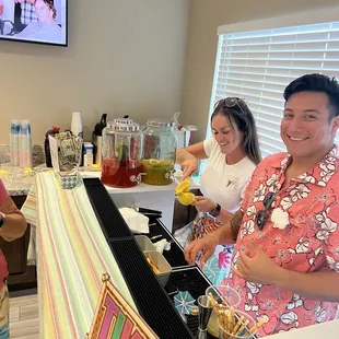 Georgie and James serving at our party