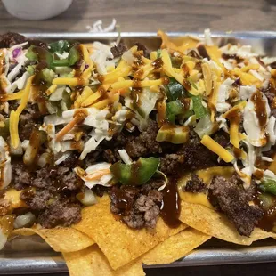 Smashed Burgers with Hill Country on Bed of Nachos