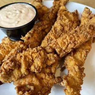 Hand breaded pork tenderloin strips.