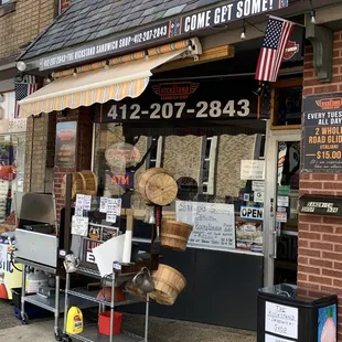 a storefront with baskets on display
