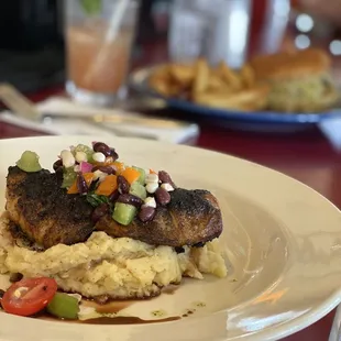 Blackened snapper with potatoes and black bean/corn salsa
