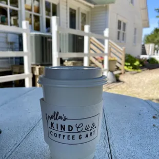 Back side of the shop - there are a few tables and some adirondack chairs near the beautiful botanical flower garden!