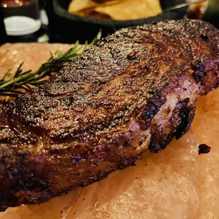 a steak on a cutting board
