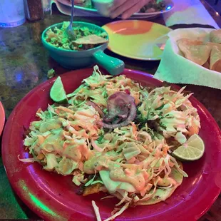 Grilled fish tacos and guacamole appetizer