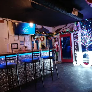 a bar with christmas decorations