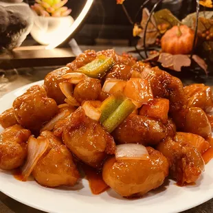 a plate of chicken and vegetables
