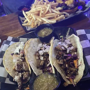 three tacos and french fries