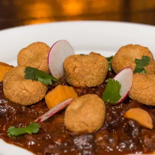 MMM : Mocha Oatmeal Stout Mole, Beef Cheek, Seasonal Pickles, Brown Butter Masa Dumplings. Nice Mole, fair amount of heat w/beef chunks