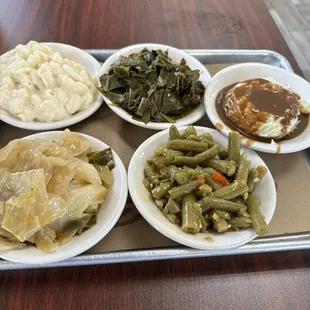 Buttered cabbage, colored greens, Mac n cheese, green beans and mashed potatoes with Jar gravy