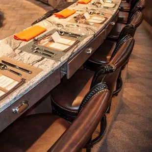 Take a seat to enjoy a chef demonstration or the meal you just learned how to prepare.