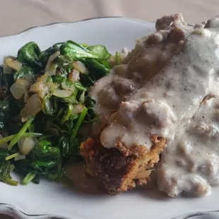 The meatloaf with mash potatoes and greens special.