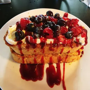 Stuffed French toast with marscapone and fresh raspberries and blueberries. So good!!!!