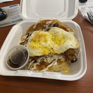 a meal in a styrofoam container