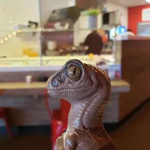Bob the Raptor says "These mammals cook the prey fresh!"