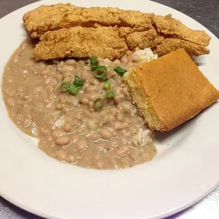 White beans and catfish. Now this is what I call lunch in New Orleans! Taste like my mom&apos;s cooking!