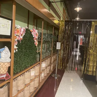 Enter into the bar through the gold streamers...