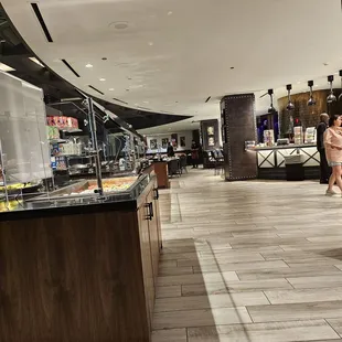 a woman standing in a restaurant