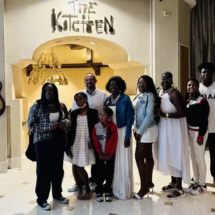 a group of people posing for a picture