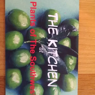 a picture of green apples on a table