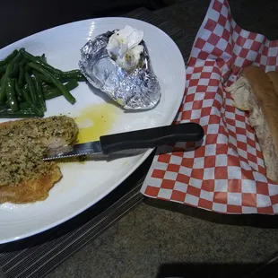 Tilapia francaise dinner &amp; bottomless breadstick basket (minus two because they were warm &amp; fresh...and yummy).