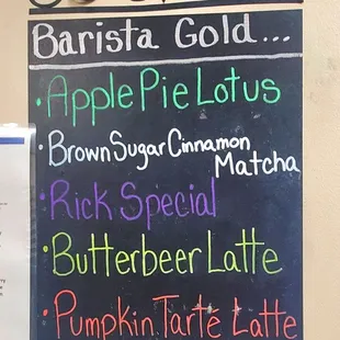 a chalkboard with a variety of drinks