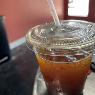 a drink in a plastic cup