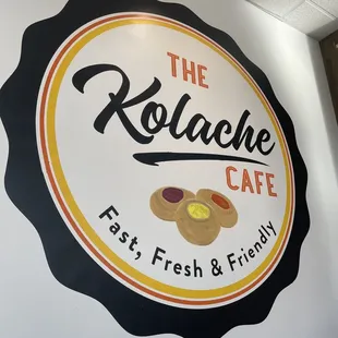 the logo on the wall