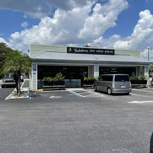 a car parked in front of a business