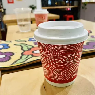 a cup of coffee on a table