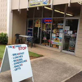 a sign in front of the store