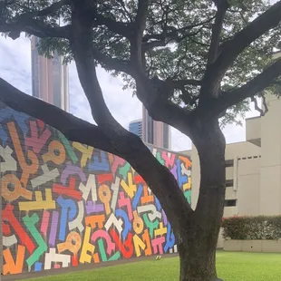 a colorful mural on the side of a building