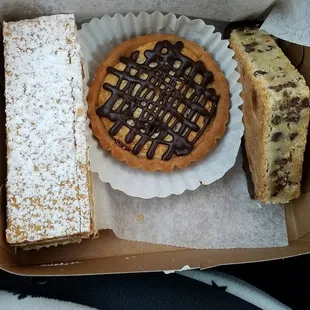 Frome left to right, napoleon, raspberry tart, and Blondie chunk.