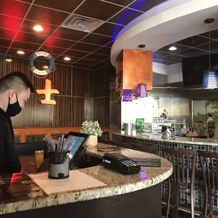 a man sitting at a bar