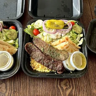 From left to right: Chicken Souvlaki Platter, lamb Gyro Platter, Cheesecake Baklava