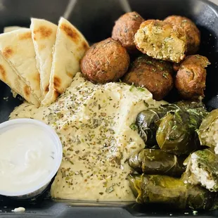 Mediterranean sampler platterpita,falafel,dolmades,hummus and tzatziki