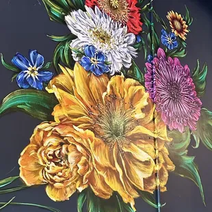 Floral murals adorn the walls