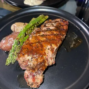 New York strip with roasted potatoes and asparagus