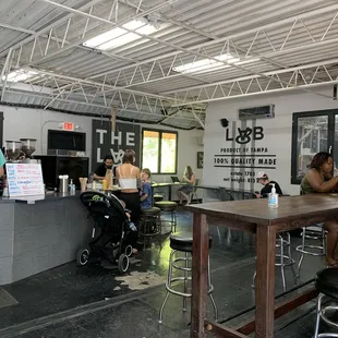 a group of people sitting at a bar