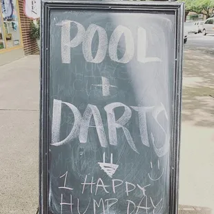a sign for pool party