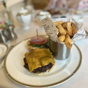 a hamburger and fries on a plate
