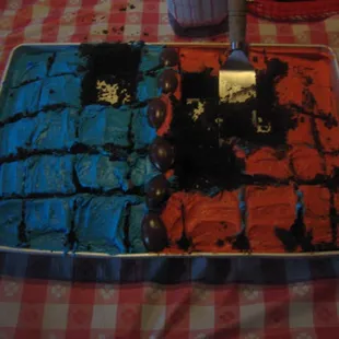 For Super Bowl Sunday, they had chili dogs (all you can eat, $4) and were nice enough to bring out Carolina/Denver themed cake slices.