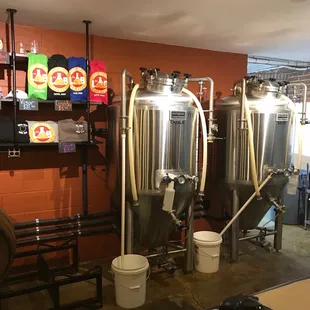 a row of beer tanks